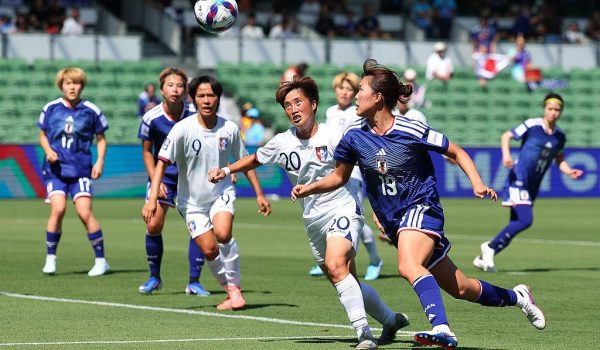 Japan player scoring against Chinese Taipei during the international football friendly